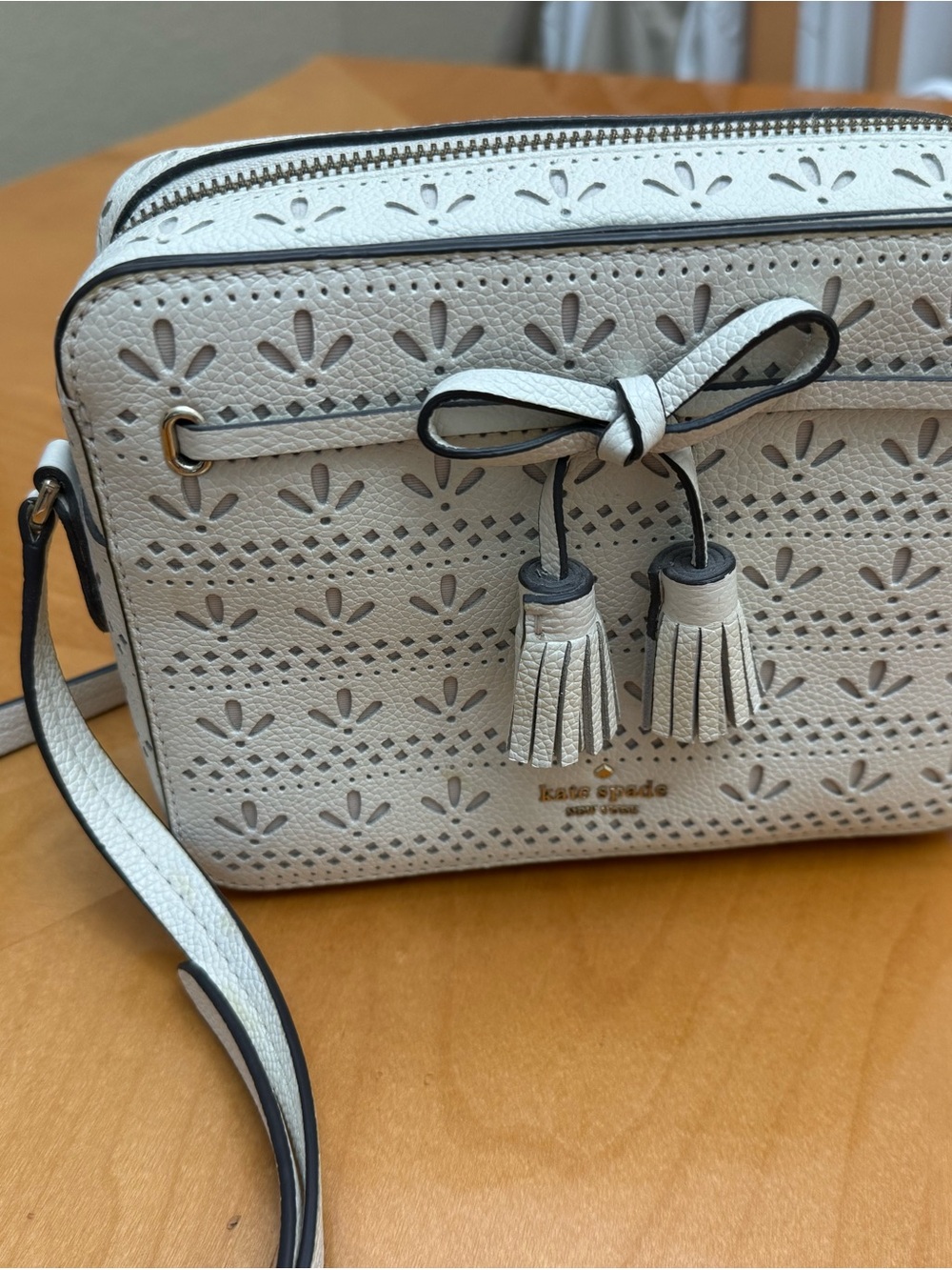kate spade White Perforated Leather Tassel Crossbody